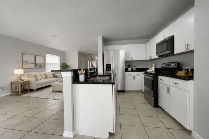 “Some images have been virtually staged using AI to illustrate potential furnishing. Property is currently unfurnished.”