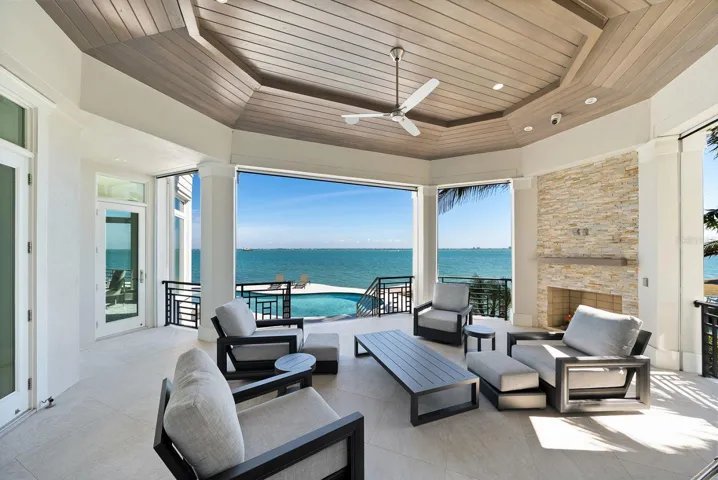 Outdoor surround lanai with disappearing screens