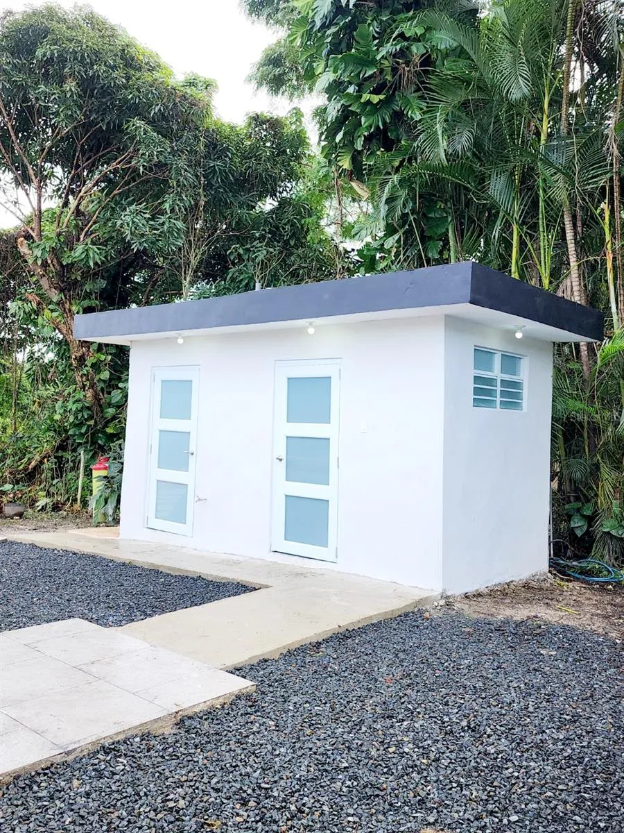 Outside full bathroom and storage with laundry