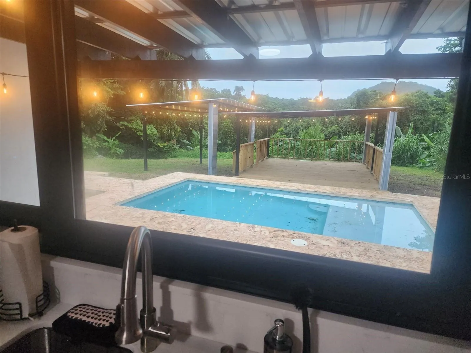 Main house pool view from kitchen
