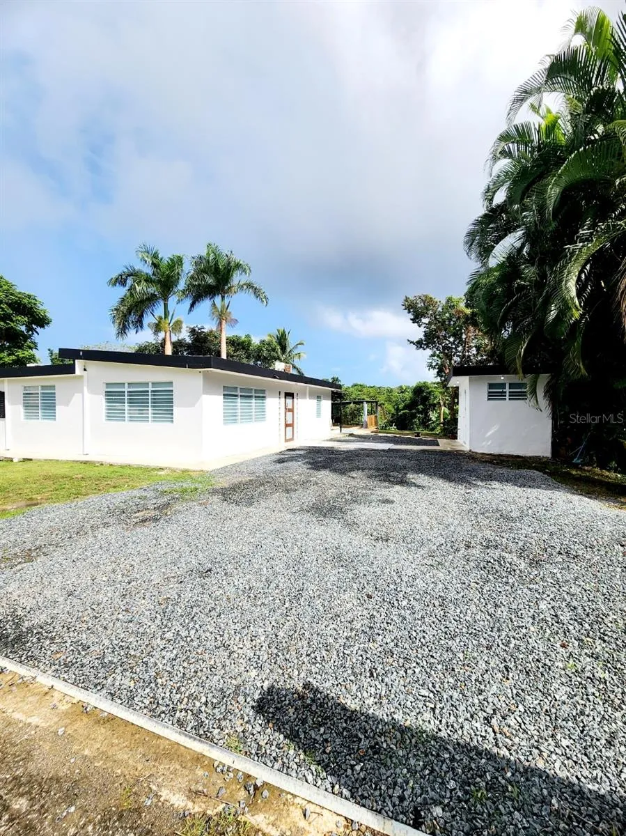 House and laundry/storage with outside bathroom