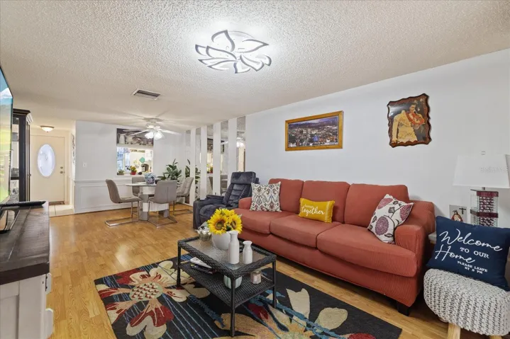 Living room & dining room views to entry way.