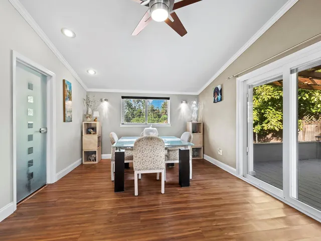 Dining room with sliders to huge deck