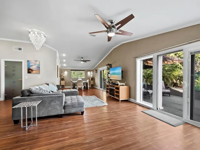 Great room and dining room open to the deck