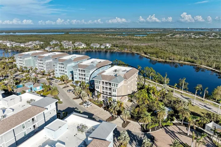 Welcome to One Particular Harbour! Amazing Sapphire Lake views!