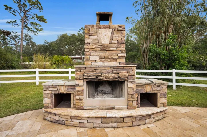 Poolside wood burning fireplace