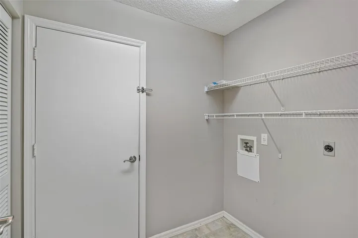 Imagine this space with wahser/dryer and cabinets...see next photo
