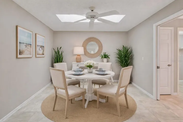 Staged furniture to give you a perspective use as a dining room.