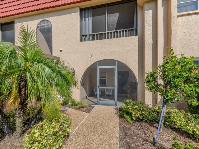 Front enterance with screened patio