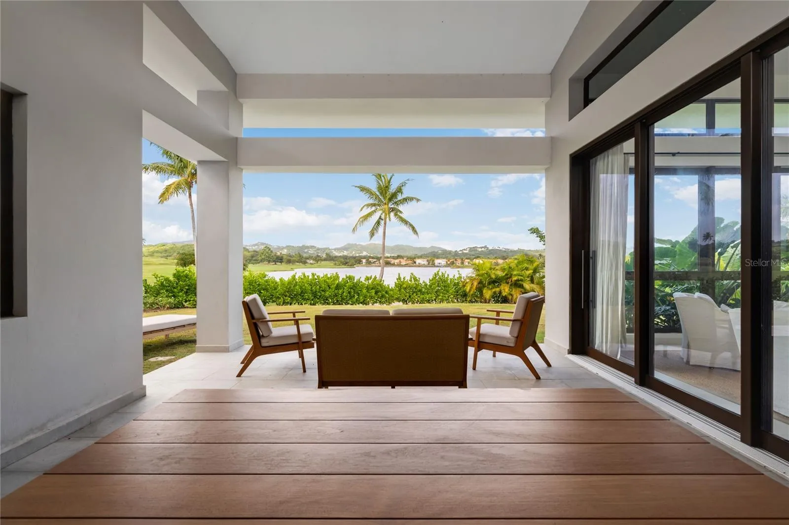 Covered Terrace with Lake and Golf Views