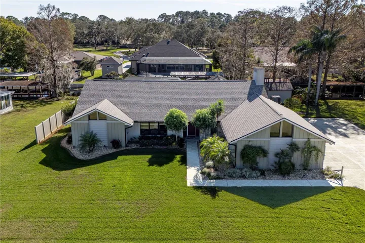 Meticulously manicured canal-front home, offering stunning water views and direct access to serene waterways—perfect for relaxation or adventure!