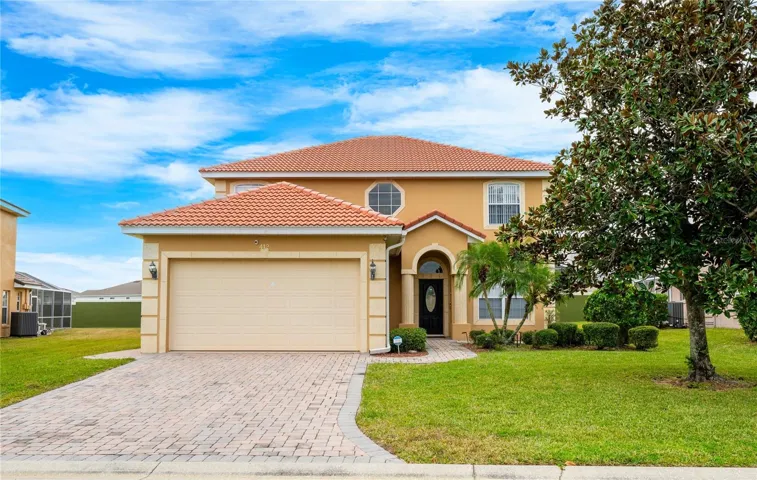 Welcome to your new home away from home or SHORT TERM RENTAL with endless investment potential in the GATED ACCESS community of Vista Park just minutes from Disney with a spacious OPEN CONCEPT floor plan that delivers 5-bedrooms, 5-full and 1-half baths, DUAL PRIMARY SUITES (one up and one down!), and tons of updates!