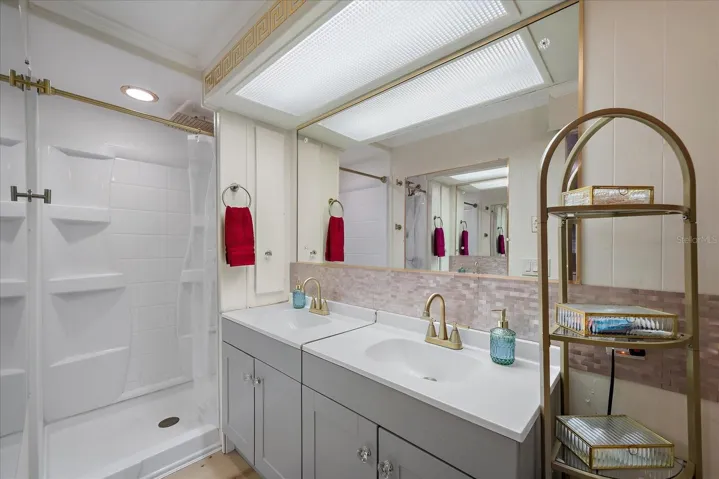 Primary bath, new vanities, step-in shower