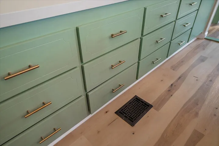 Close up of vinyl flooring; also all new floor AC vents throughout . . .
