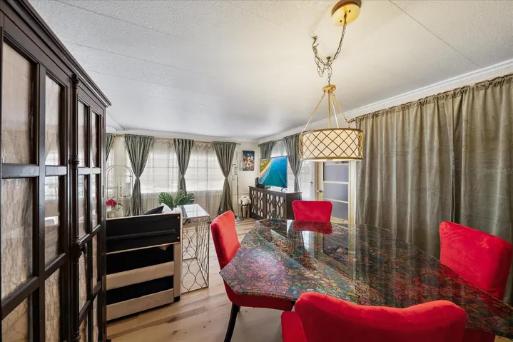 Close up of dining area . . . (door leads to sunroom/family room)