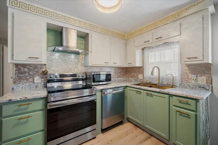 All new kitchen, high-end range w/air-fryer, designer sink . . .granite counters . . .