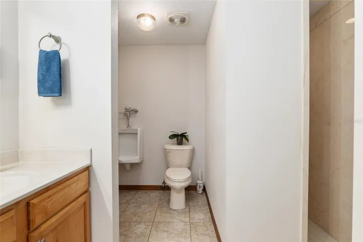 Master bathroom walk-in shower and full bathroom commode