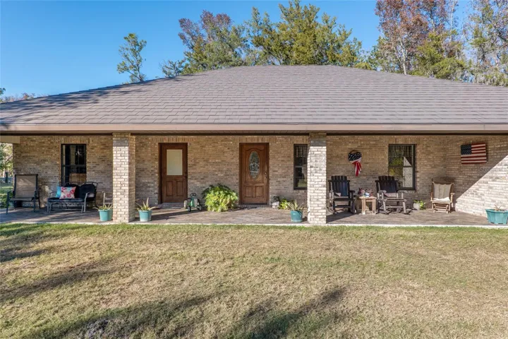 Brick home with metal architectural roof