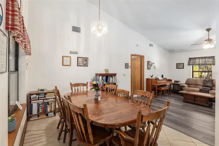 Dining room with cathedral ceilings