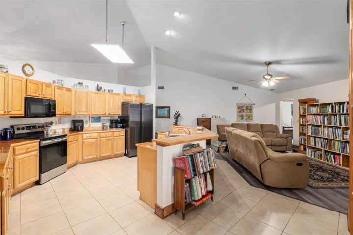 Open concept kitchen with cathedral ceilings.  Perfect for entertaining!