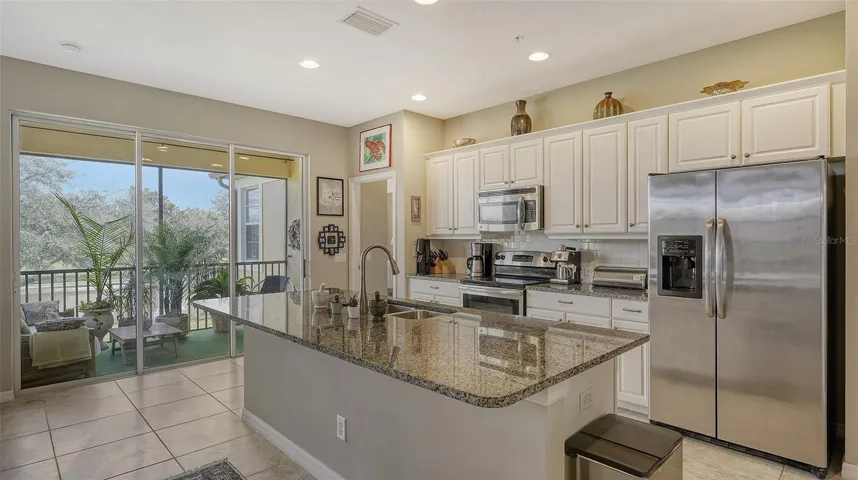 Kitchen Features Granite & Stainless Appliances