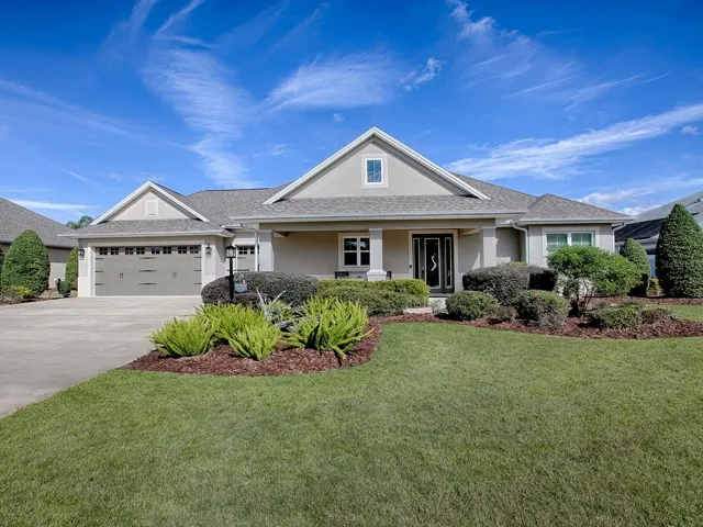 SPECTACULAR 3 BEDROOM, 3 BATH EXPANDED SEABROOK PREMIER WITH OVERSIZED GARAGE IN THE PRESERVE IN THE VILLAGE OF PINE HILLS.