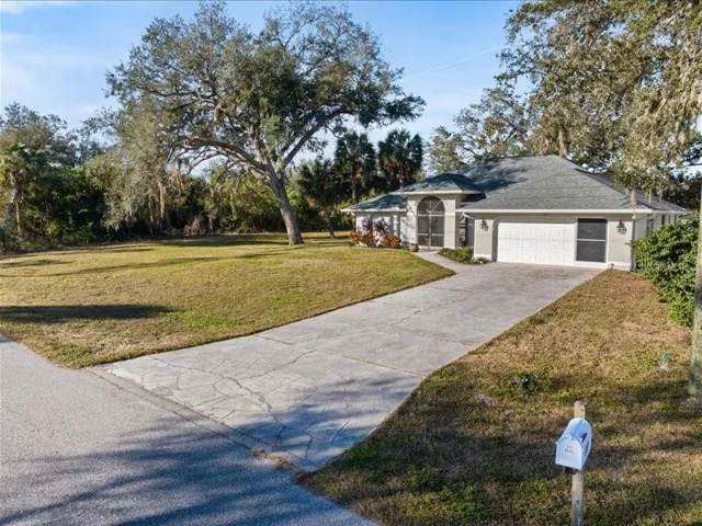 DOUBLE LOT 160 x125 (2 80' x 125' lots) 160' of backyard waterfrontage. Church owns vacant wooded lot in front.