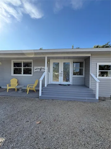 front trex porch with art glass doors