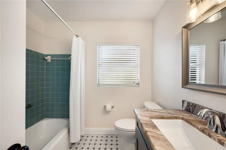 The homes main bathroom has also been beautifully updated.