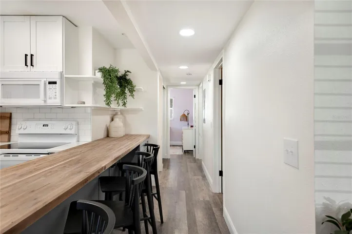 Back to the kitchen , down the hall to the bedrooms and main bathroom