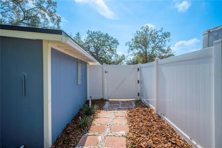 Walk way and gate to the front of home