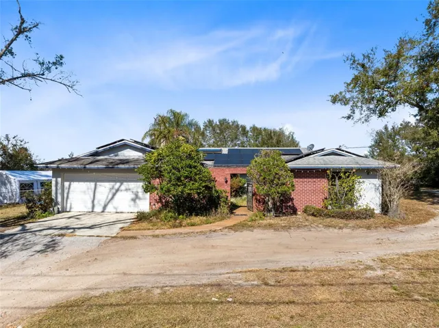 Welcome to a private retreat located on almost an acre of land.