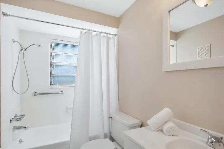 Guest bathroom with new vanity and fixtures