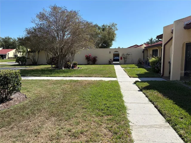 Sidewalk from unit leading to your assigned covered parking