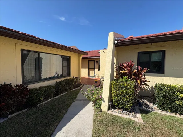 Sidewalk leading to the corner units