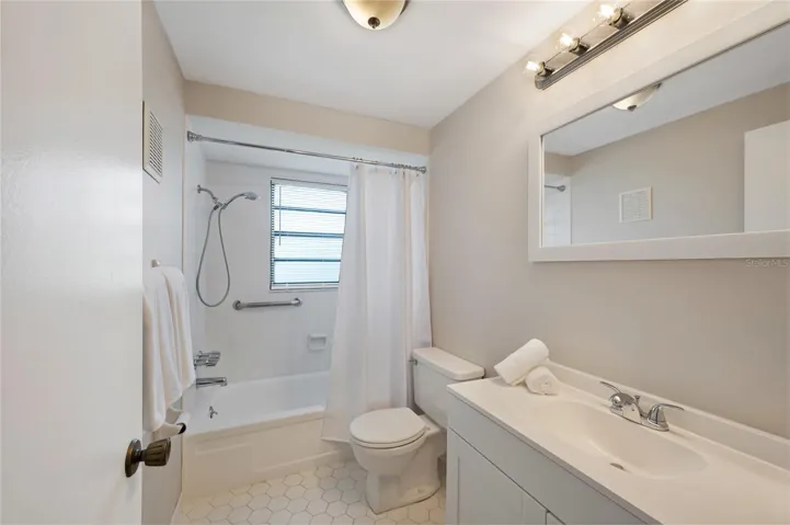 Guest bathroom with tub/shower combo
