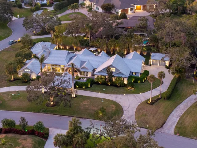 5 bedroom, 5 full and 2 half baths within the prestigious gated community of Beneva Oaks
