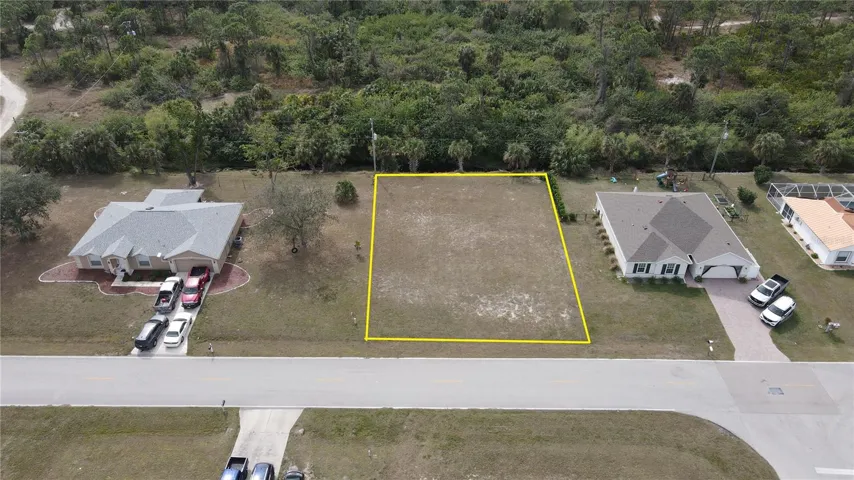 Privacy. Right: This home has a fenced rear yard that is hidden by bushes.  Rear: The woods to the rear are perfect for privacy.  Left: This home is on 2 lots, so there will not be a house built right next to yours.