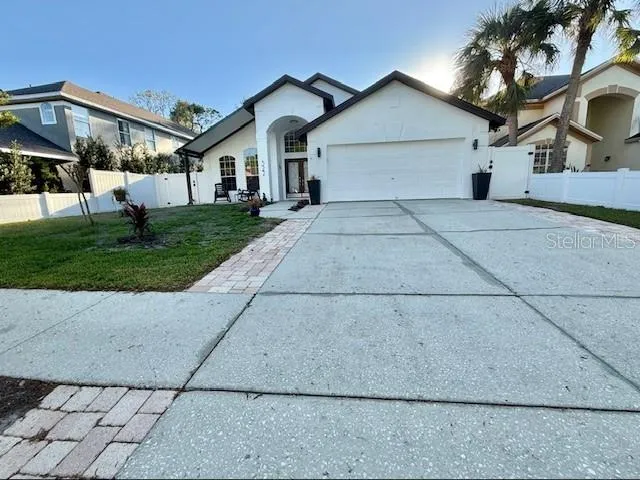 This Beautiful home with a front porch and two car garage.