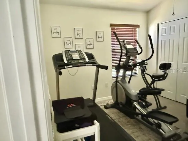 Bedroom 3, used as a gym.