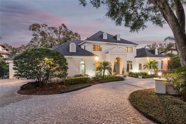 Beautiful LAKEFRONT home in the heart of Delaney Park on half acre lot