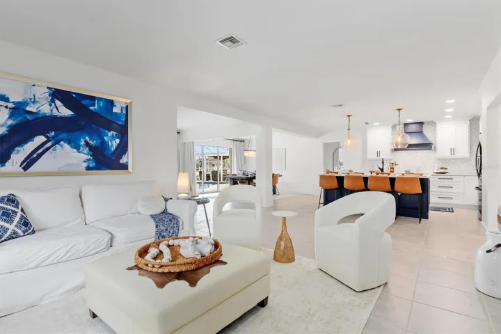 Living room looking towards kitchen and dining area