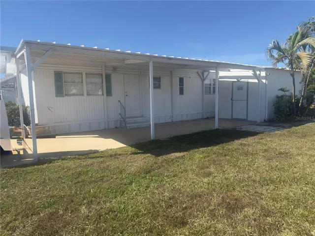 Covered Carport and Laundry Shed