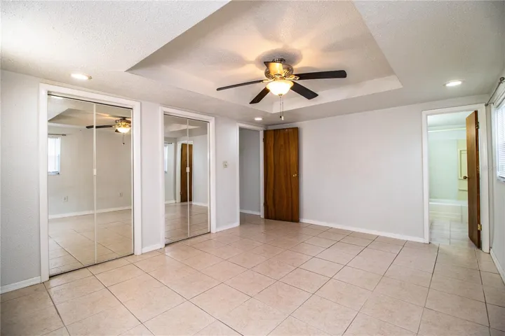 UNIT 2 - DOWNSTAIRS - BEDROOM WITH MIRROR CLOSET DOORS