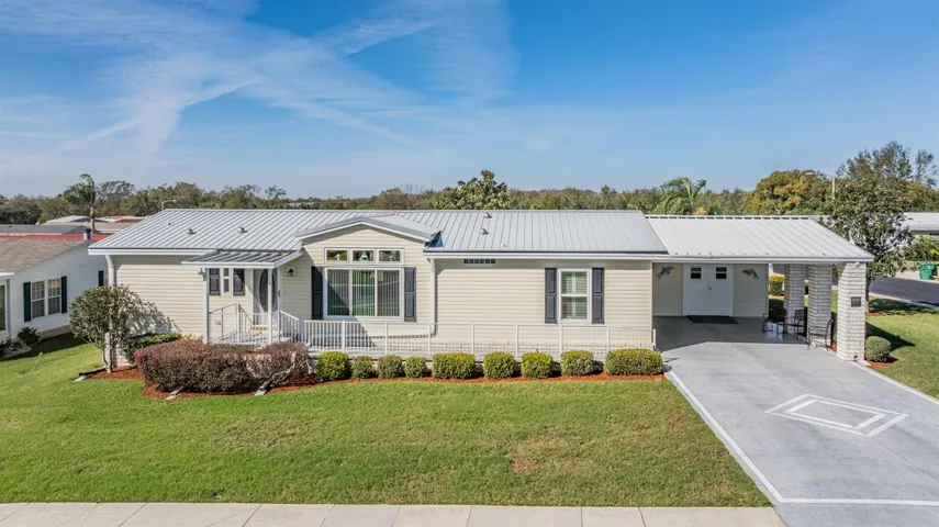 Great curb appeal, metal roof, side by side parking and corner lot!
