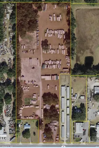 Property area shaded in red.