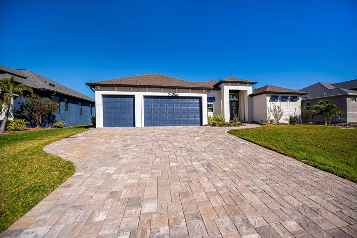Beautiful curb appeal on this nearly new waterfront home!