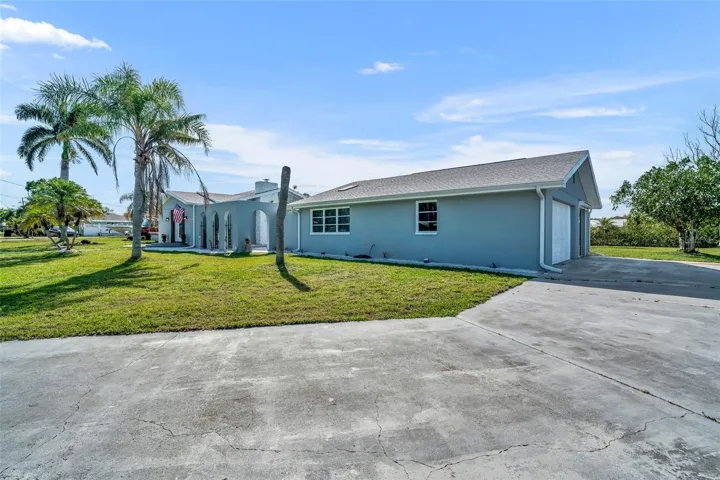 Large driveway to garage area