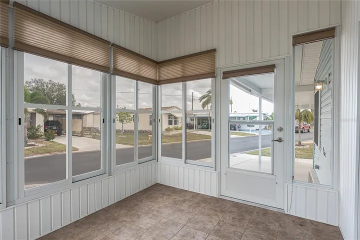A46417773317 Denise Dr Ellenton, FL 34222Front Sun Room Patio with solid vinyl windows.