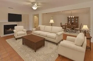 Living, dining room showing with furniture staged
